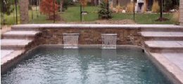 Custom waterfalls built to enhance the beauty of your inground pool or backyard waterscape.